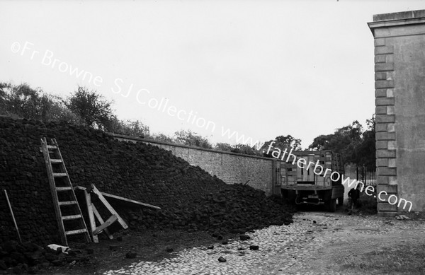 WARTIME TURF STACTING IN YARD